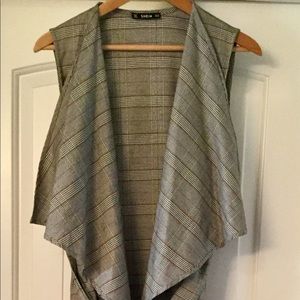 Duster Grey with light brown strips .